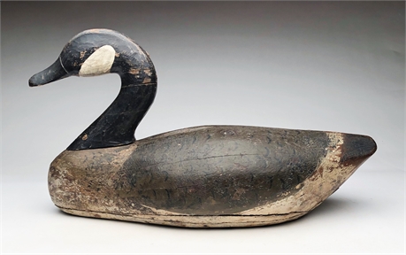 Large, hollow carved goose with bottom board, circa 1900.