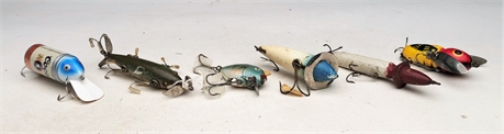 Group of vintage fishing lures.